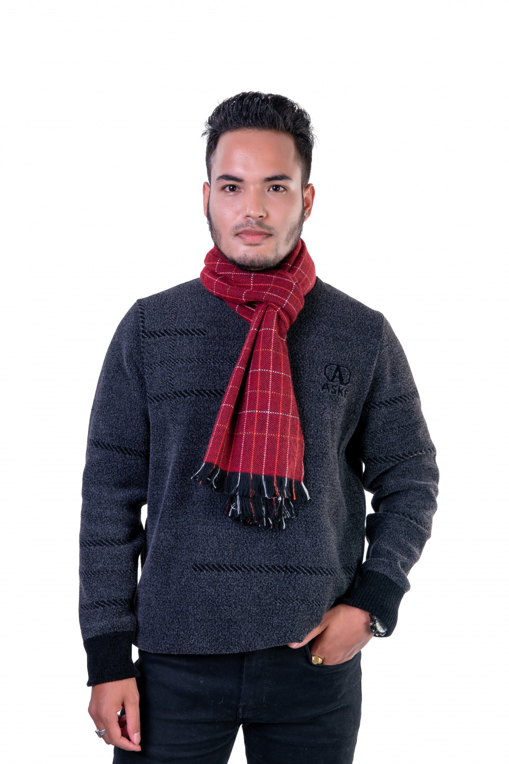 Elegant red cashmere scarf featuring a classic herringbone weave, perfect for winter style.