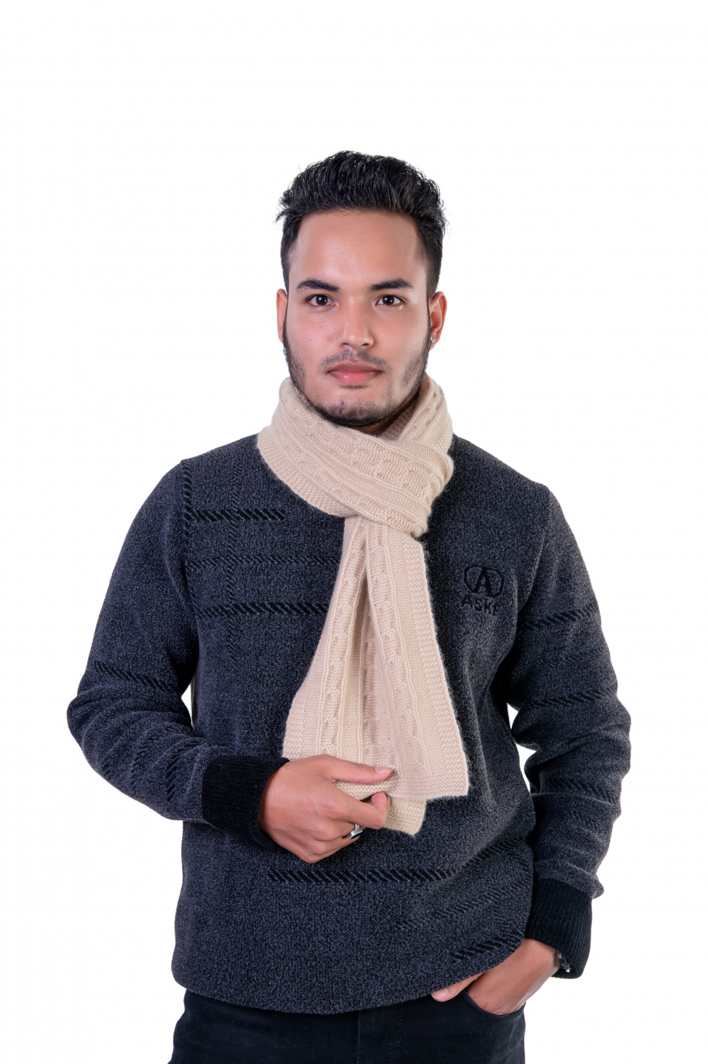 Knotted beige cashmere scarf in a classic cable-knit design, showcasing its premium quality.