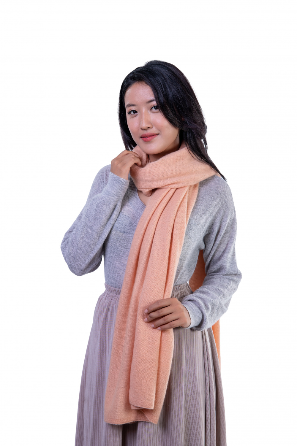 Soft and Luxurious cashmere scarf in muted coral.