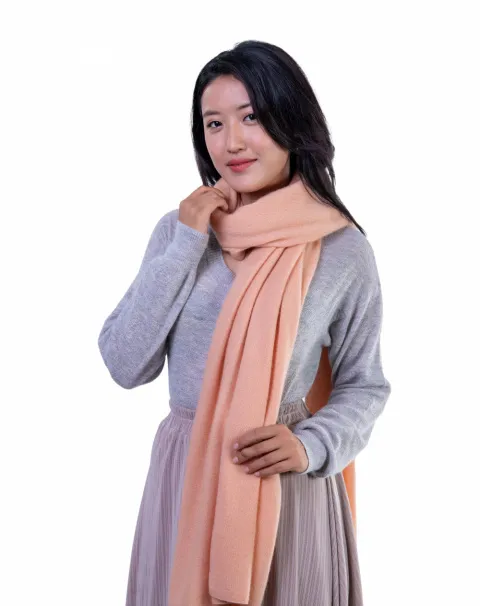 Soft and Luxurious cashmere scarf in muted coral.