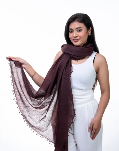 Featherlight Cashmere Wrap in Deep Plum. 