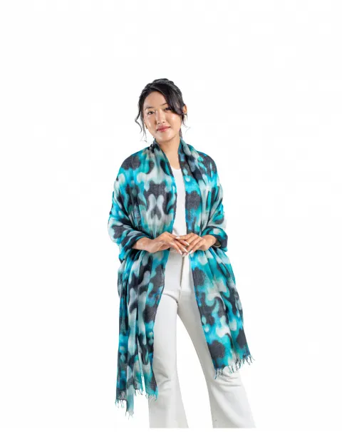 Blue Dahlia Featherlight Cashmere Scarf styled as a wrap on a model